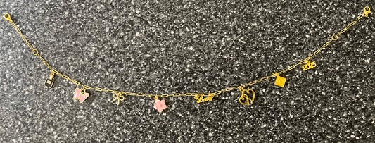 Pink and gold pant charms